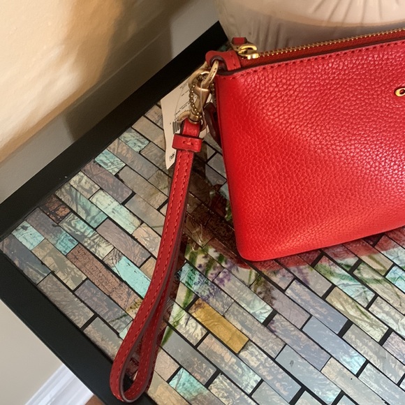 Coach Leather Wristlet
COACH - Picture 3 of 17